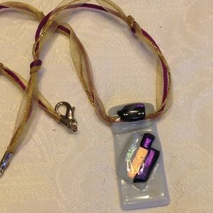 Fused glass necklace. Purples